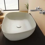 Vitra Outline Recycled Çanak Lavabo Tv Şekilli, 63x42 cm Armatür Deliksiz, Su Taşma Deliksiz, Mat Bej - 7993B066-0016 - Çanak Lavabo - 1